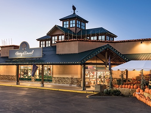 Harry & David Country Village storefront in Medford with its signed entrance and seasonal outdoor display