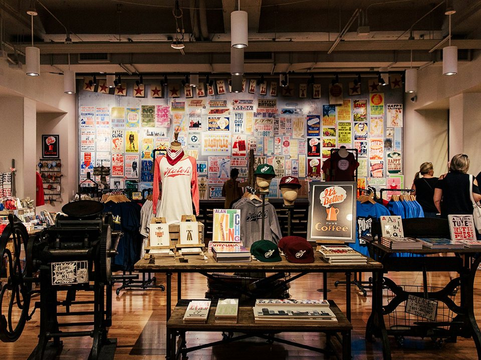 Hatch Show Print retail room with letterpress posters, apparel, books and printing equipment