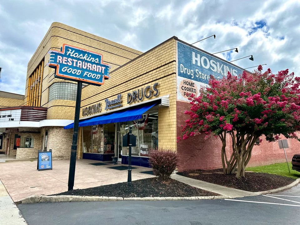 Current Hoskins Drug Store storefront in Clinton with its restaurant sign and historic drug-store lettering