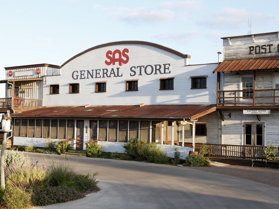 White Old West-style SAS General Store facade at the San Antonio factory property