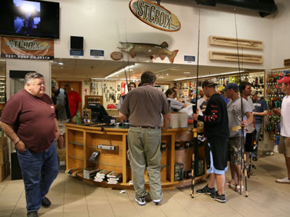 Shoppers browse rods and tackle inside the St. Croix Rod Factory Store in Park Falls